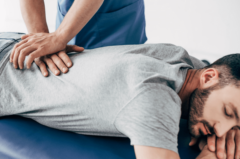 A therapist performing a myofascial release session on a client at Hands On HealthCare Massage Therapy in Commack, Long Island.