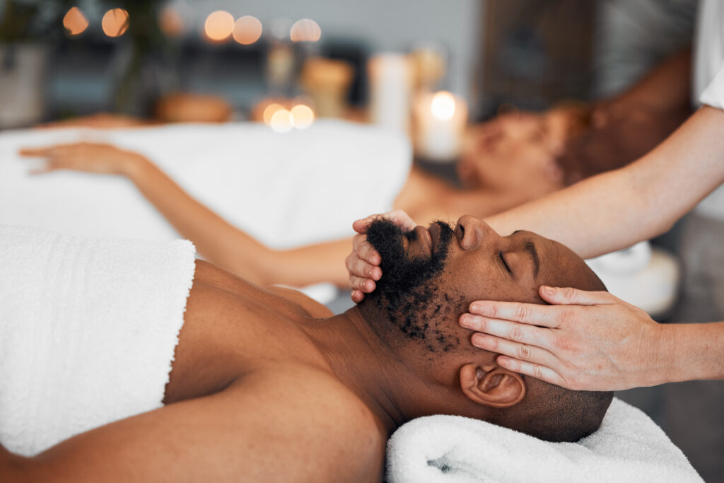 A couple enjoying the “Facetime With Me” facial massage experience at Hands On HealthCare Massage Therapy in Commack, Long Island.