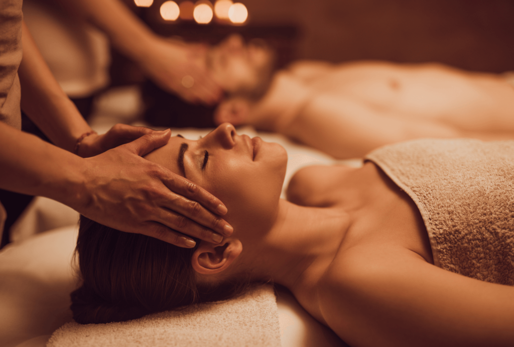 Two individuals experiencing a romantic couples massage in Commack, Long Island.